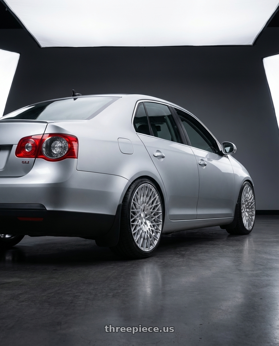 2009 Volkswagen Jetta GLI MK5 with Avant Garde Wheels M540 5X112 18x9 +48 Silver Machined wheels rear three quarter view square tires