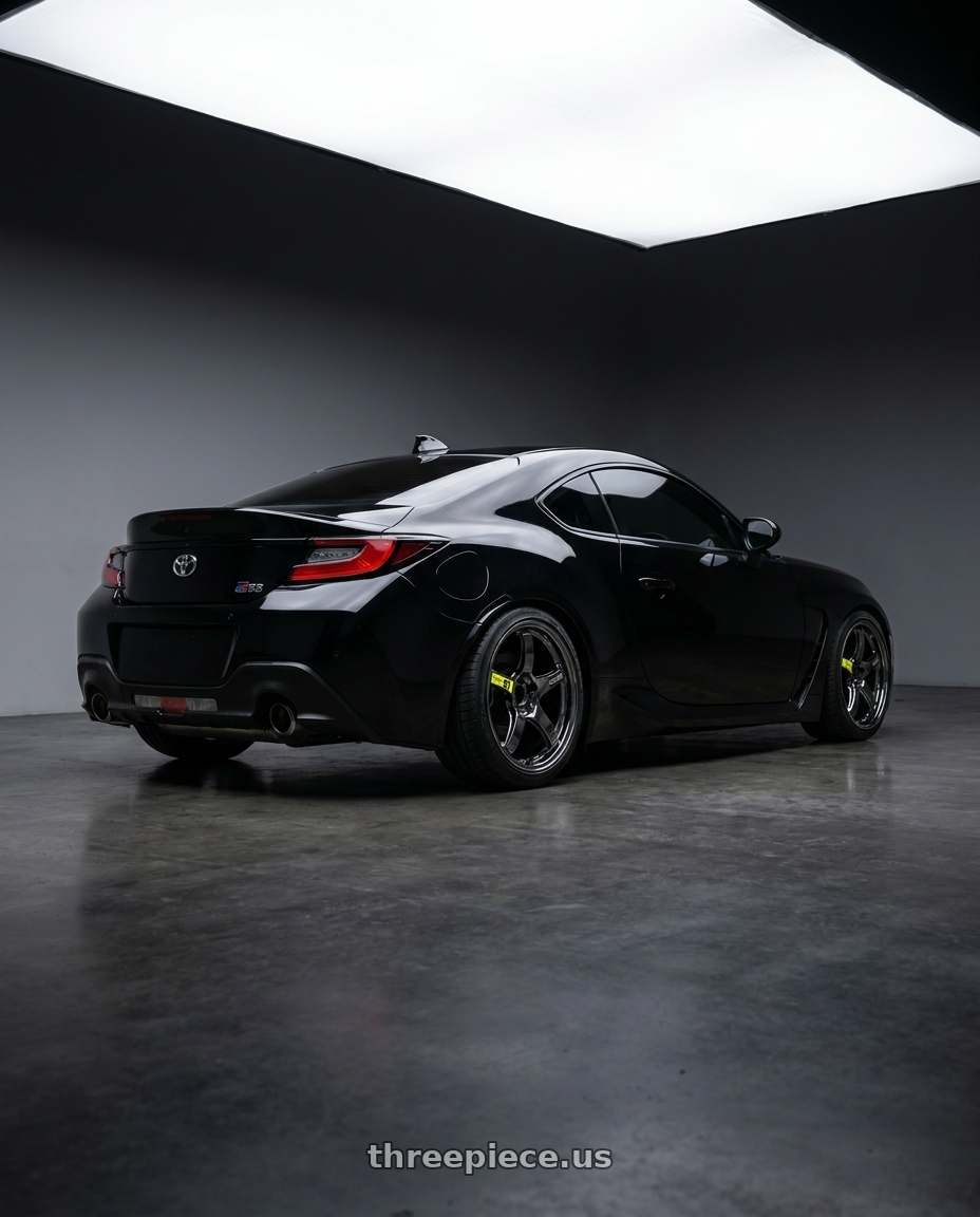 2022 Toyota Gr86 Black with Gram Lights 57CR LIMITED 5x114.3 18x9.5+22 Rays Black Metal Coat wheels rear three quarter view square tires