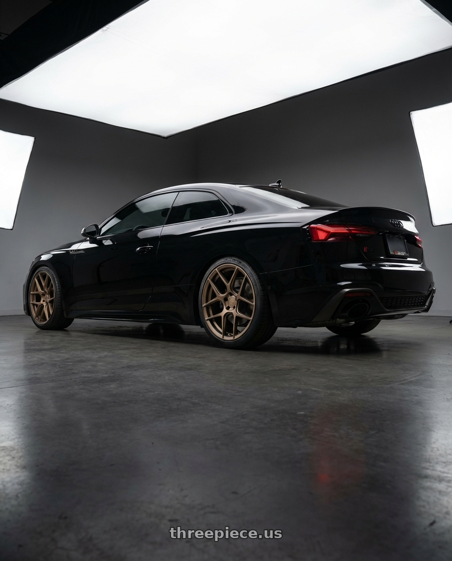 2022 Audi RS5 with Aodhan AFF2 5x112 20x9+30 Matte Bronze wheels rear three quarter view square tires