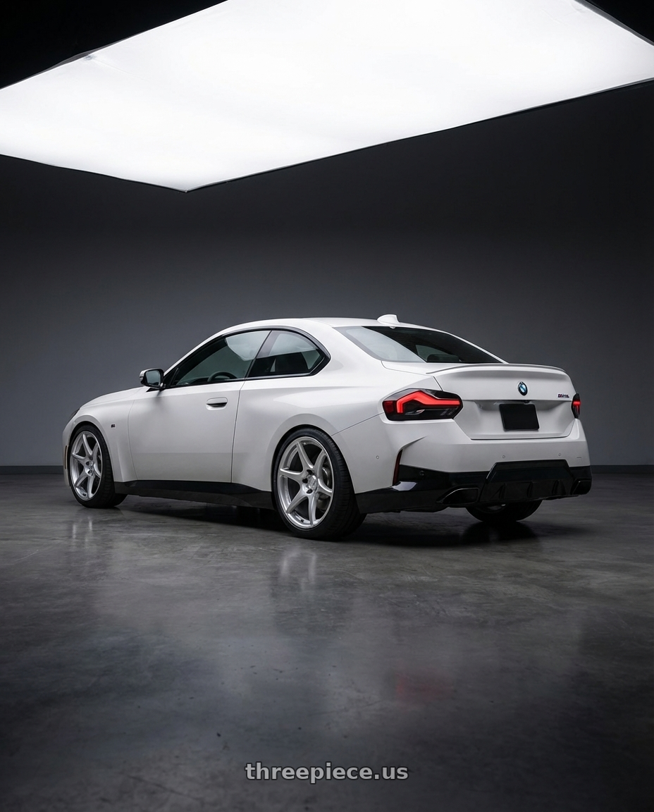 2024 BMW 2 Series G42 with Kansei K11S Tandem 5X112 19x10.5 22 Hyper Silver wheels rear three quarter view square tires