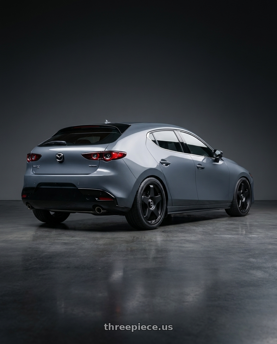2023 Mazda Mazda3 Turbo with fifteen52 CHICANE 5x114.3 / 5x100 18x8.5 +35 ASPHALT BLACK (SATIN BLACK) wheels rear three quarter view square tires