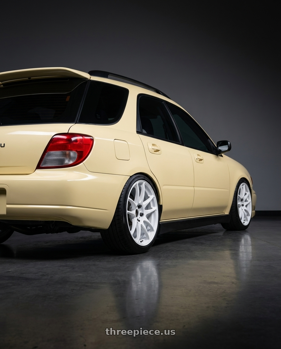 2002 Subaru wrx with Work Emotion CR Kiwami wheels rear three quarter view slight stretch tires