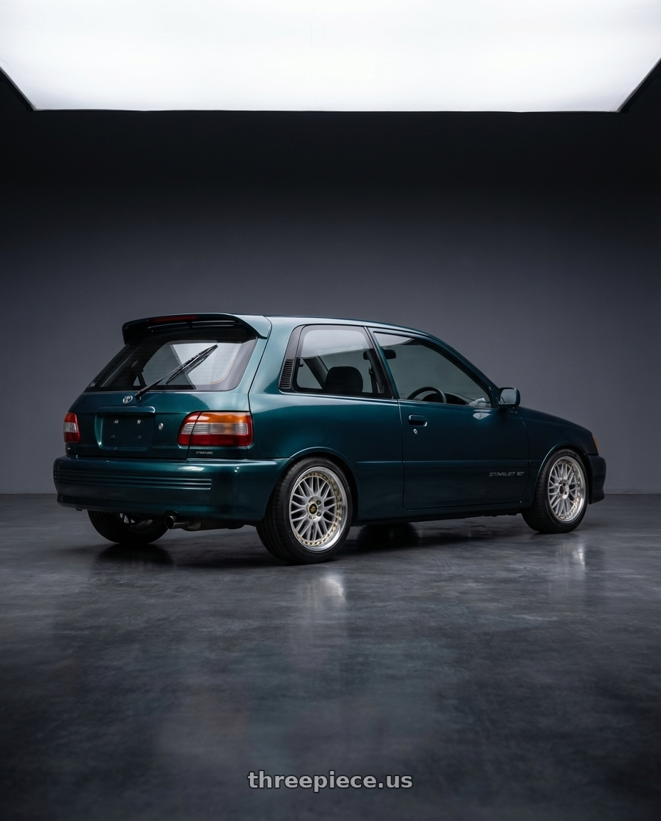 Toyota Starlet GT 1994 with Work Vs-Xx 5x100 18x7.5+19 A Disk Light Grey Silver wheels rear three quarter view square tires