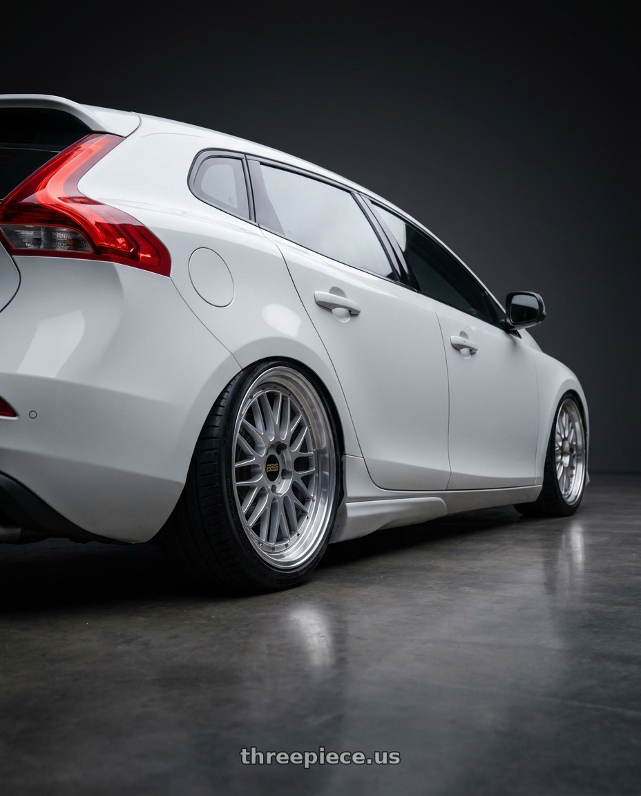 2015 Volvo V40 with BBS LM 5x114.3 19x9.0+38 Diamond Silver wheels rear three quarter view square tires