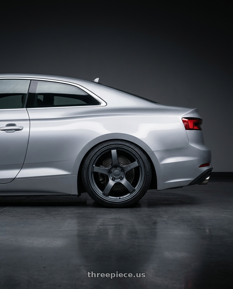 2018 Audi A5 with Gram Lights 57CR 5x100 18x9.5+38 Gunblue II wheels rear three quarter view square tires