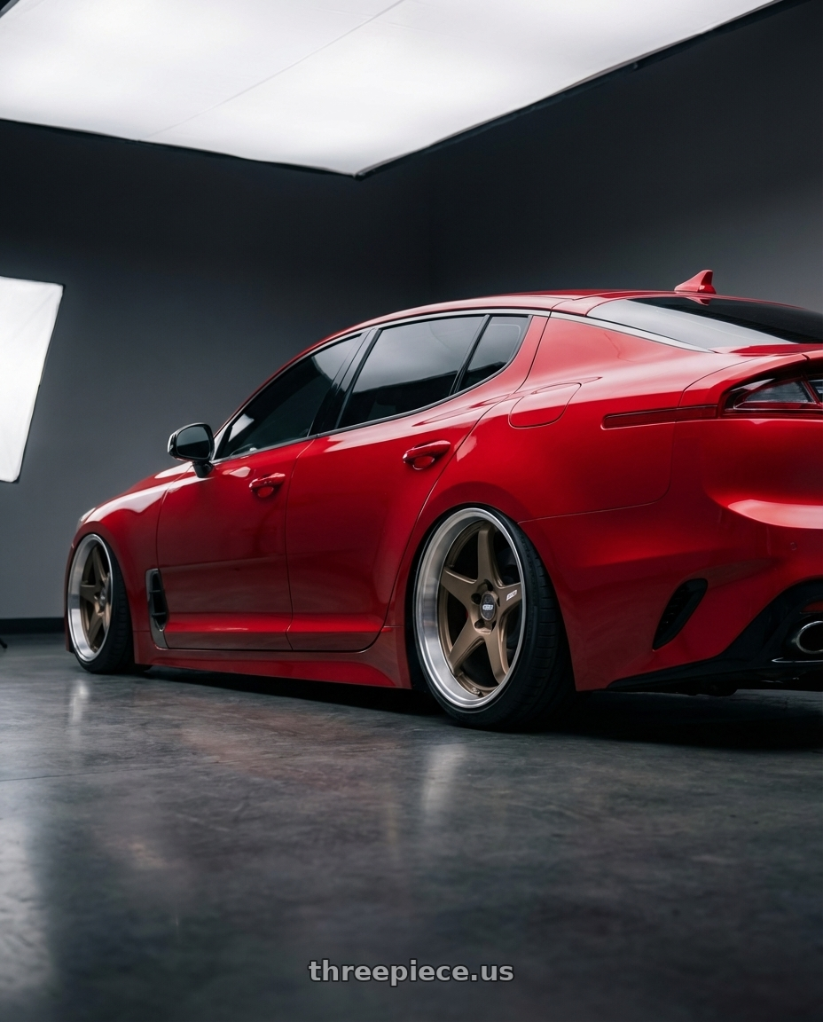 2022 Kia Stinger GT with ESR Wheels APEX SERIES AP5 5x114.3 19x11 +22 Matte Bronze wheels rear three quarter view slight stretch tires