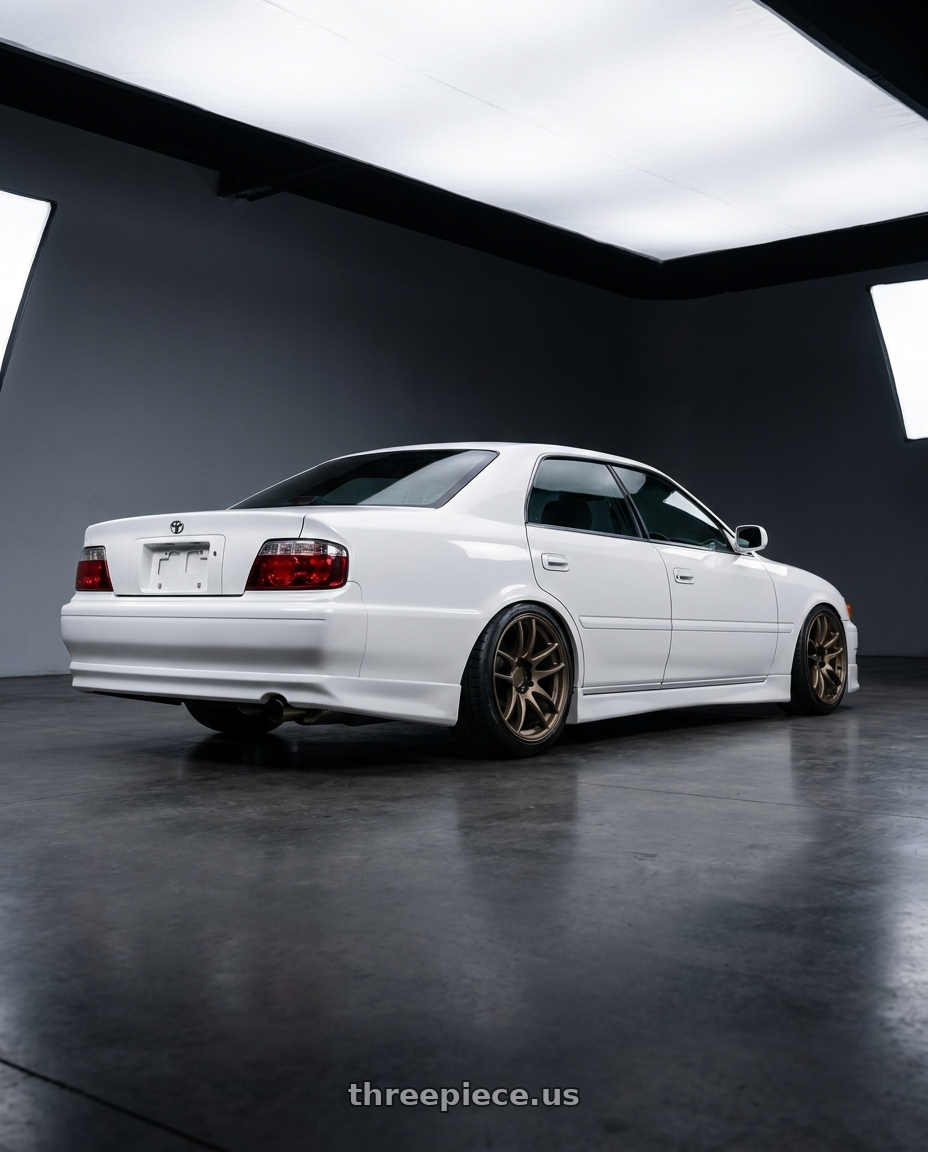 1996 Chaser Tourer V with Work Emotion Cr Kiwami 5x100 18x9.5 +12 Matte Bronze wheels rear three quarter view slight stretch tires