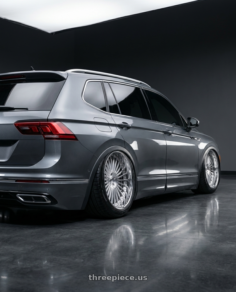 2022 Volkswagen Tiguan elegance Dolphin Grey Metallic  with Amani R.E.A.L. 5x112/5x120 22x9 +32 Brush Center Chrome Lip wheels rear three quarter view meaty tires