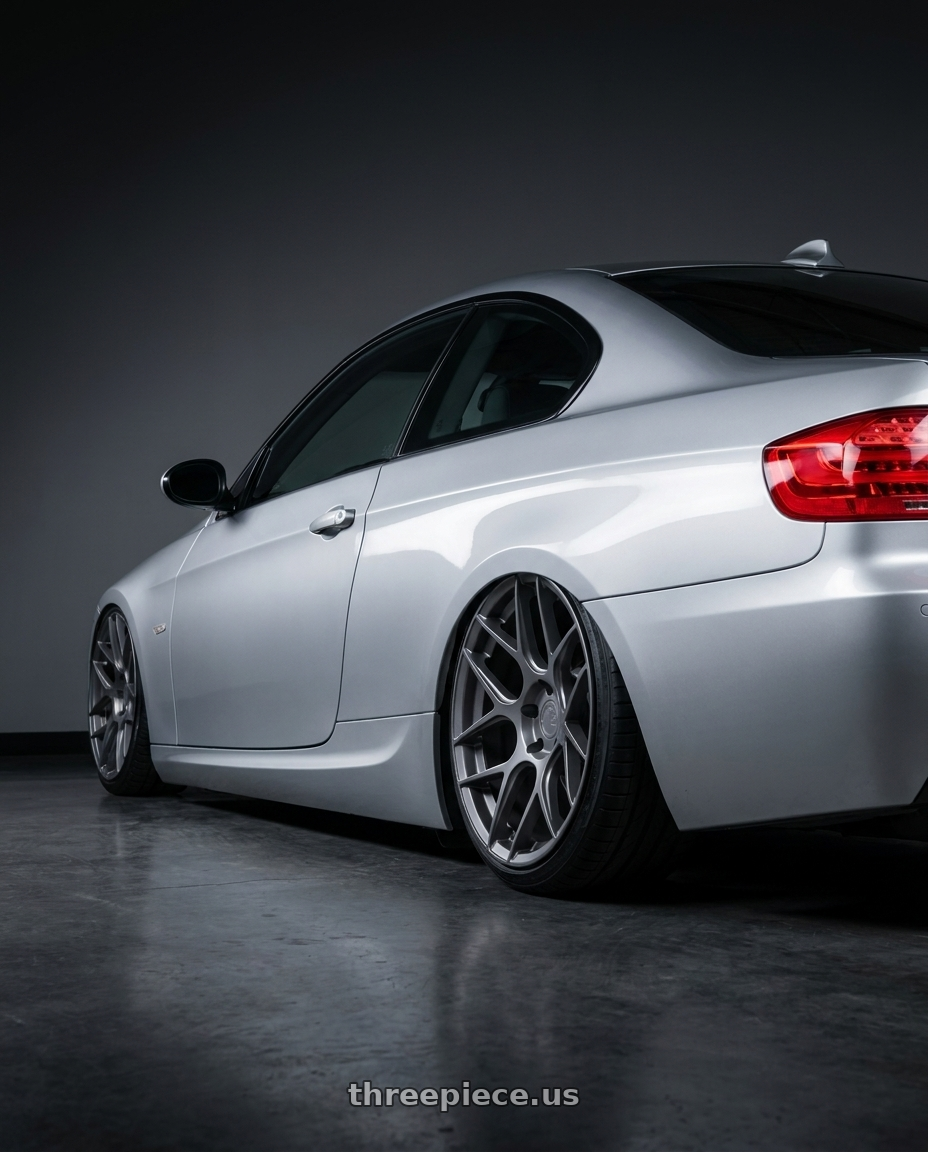 2012 BMW 3 Series E92 with Aodhan AFF2 5x120 19x8.5+35 Matte Gray wheels rear three quarter view slight stretch tires