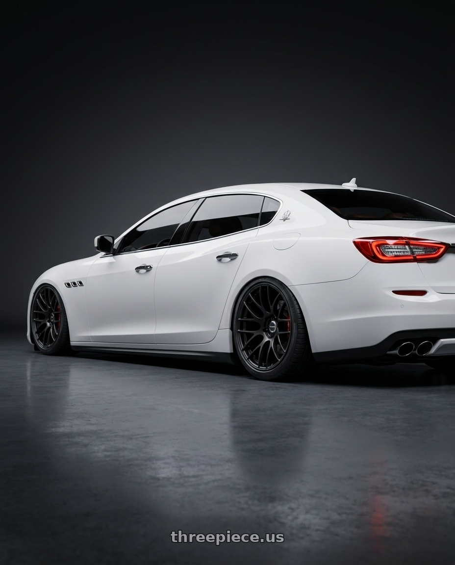 2014 maserati quattroporte gts  with Work Emotion m8r 5x114.3 20x10.5 +38 Grants Black wheels rear three quarter view square tires
