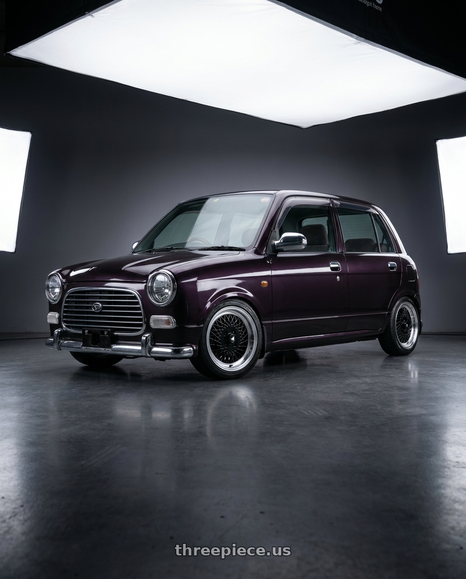 2000 Daihatsu Mira Gino with Enkei Enkei92 Classic Line 4x100 15x7+38 Black wheels