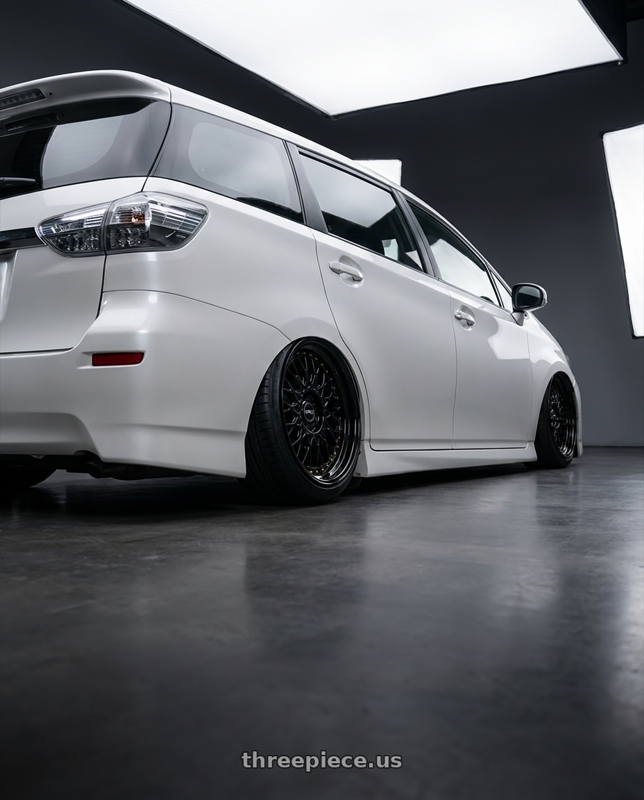 2016 Toyota Wish 2.0 with ARC AR1 5x112 17x8.5  +35 All Black Gold Rivet wheels rear three quarter view slight stretch tires