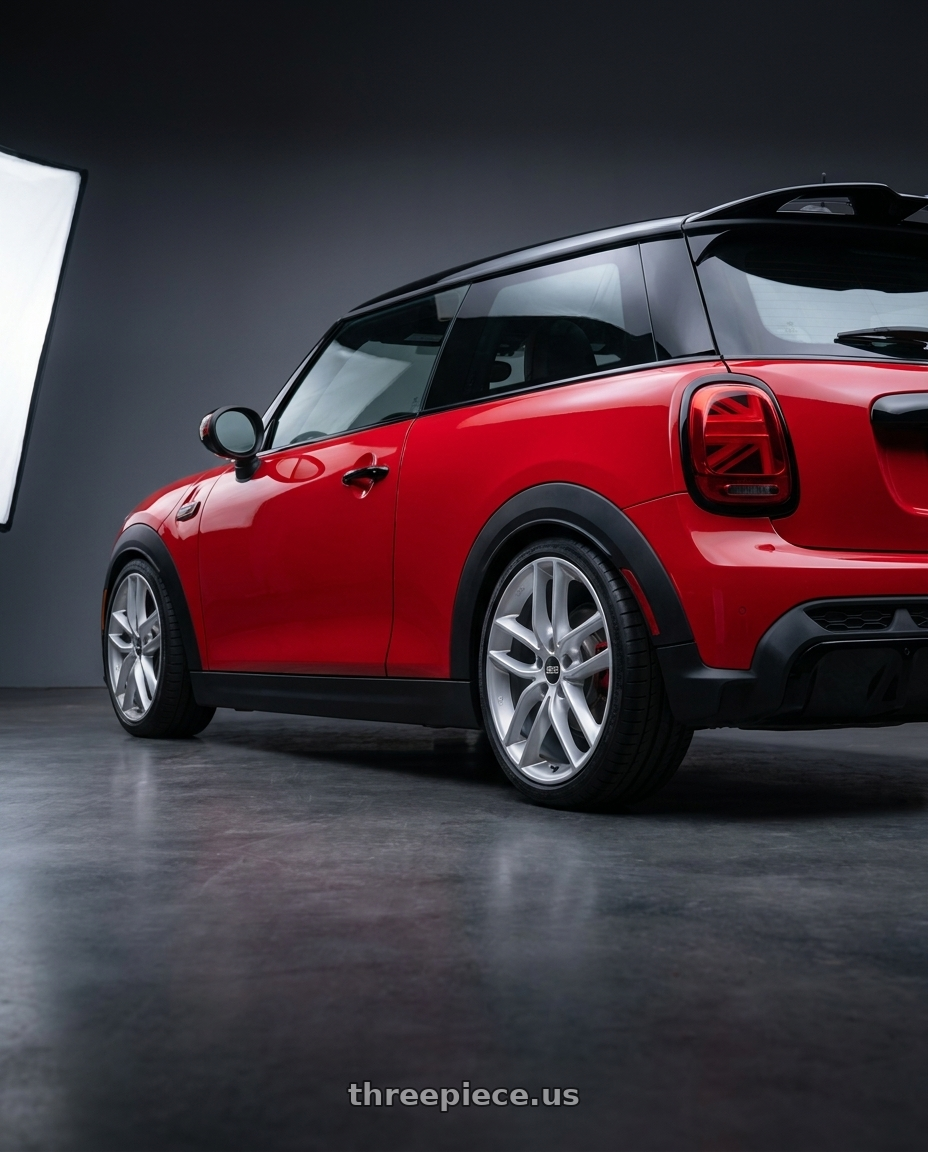 2025 mini jcw red with BBS SX 5x112 18x8.0+44 Sport Silver wheels rear three quarter view square tires