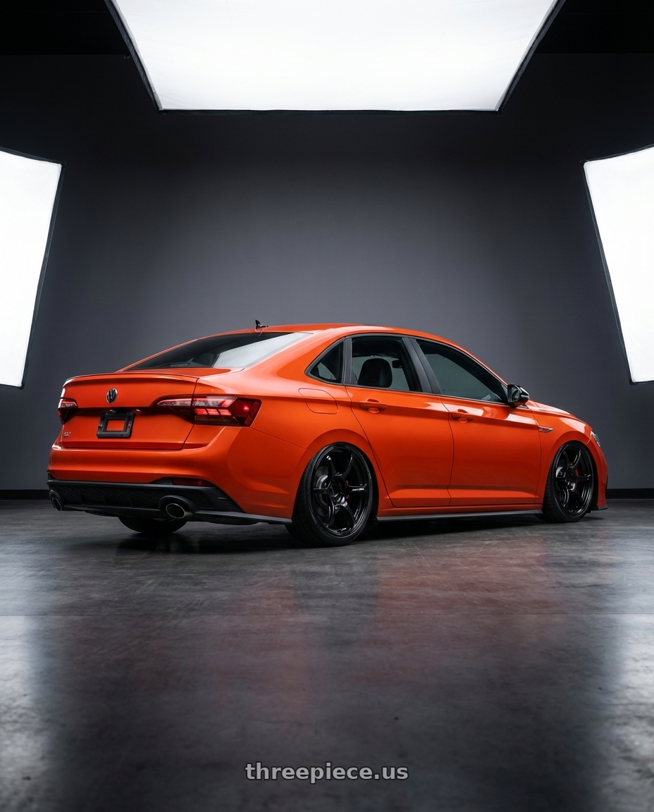 2023 Volkswagen Jetta GLI MK7 with Advan RGIII 5x112 19x8.5+45 Gloss Black wheels rear three quarter view slight stretch tires