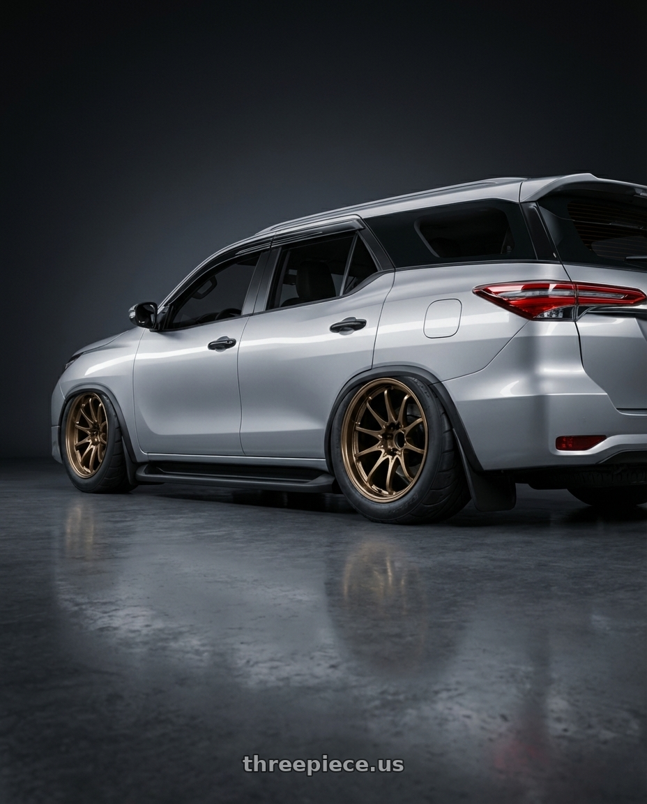 2022 Toyota Fortuner with Volk Racing CE28N-PLUS 5x112 18x10.5 +34 SHINING BRONZE METAL wheels rear three quarter view meaty tires