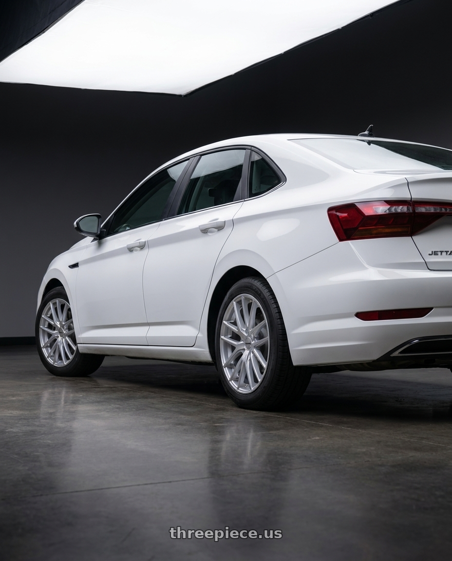 2019 Volkswagen Jetta Sel with TOUREN TR60 3260 5x112/5x120 17x7.5 +42 GLOSS HYPER SILVER wheels rear three quarter view square tires