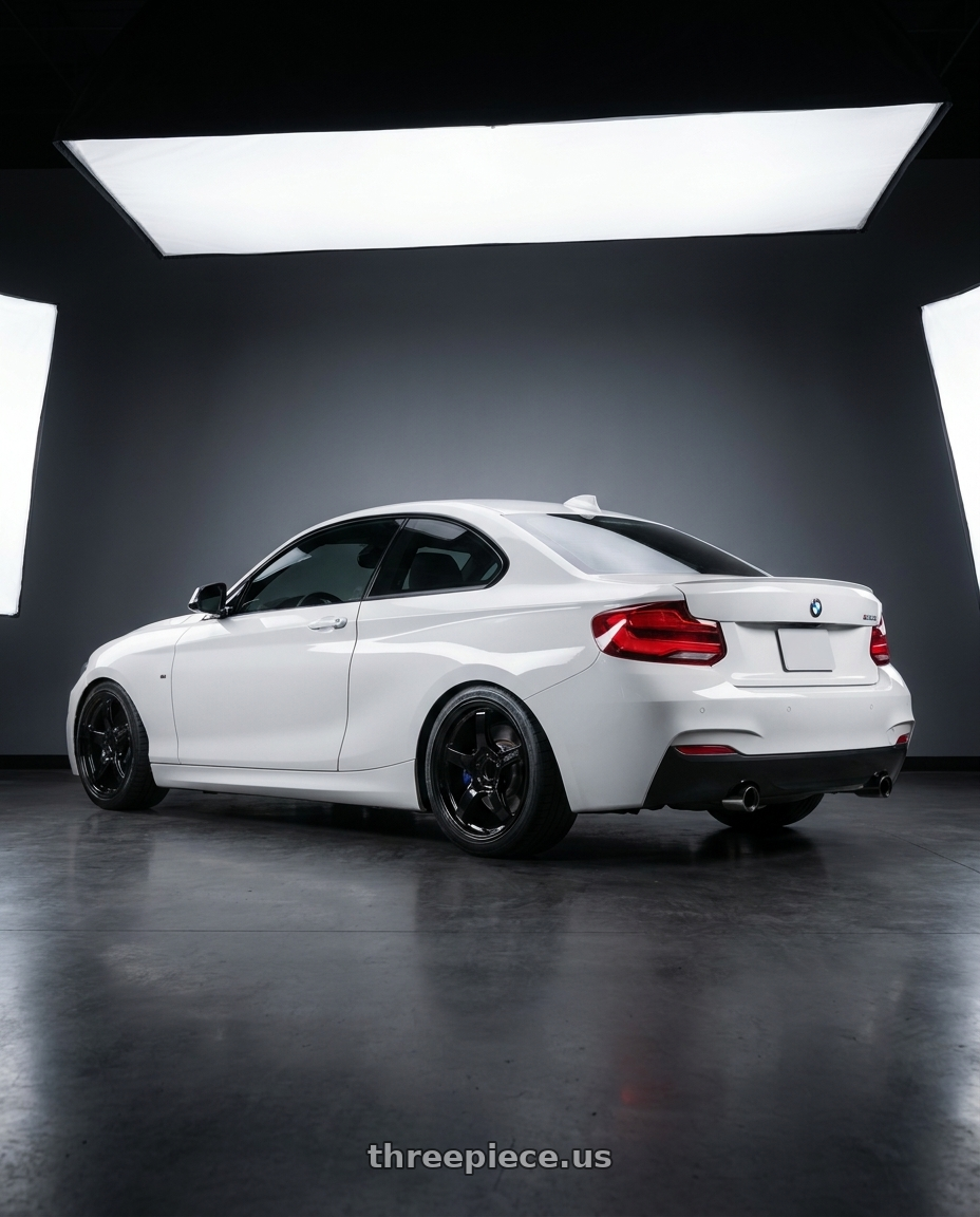 2018 BMW 2 Series F22 with Gram Lights 57CR 5x120 18x9.5+38 Glossy Black wheels rear three quarter view square tires