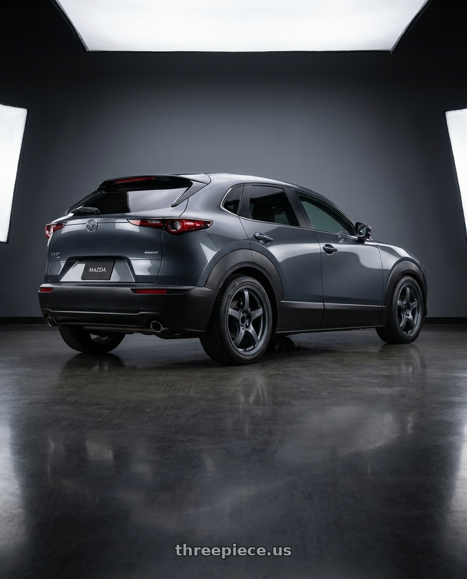 2026 mazda cx-30 with Gram Lights 57CR 5x114.3 17x9+22 Gunblue II wheels rear three quarter view square tires