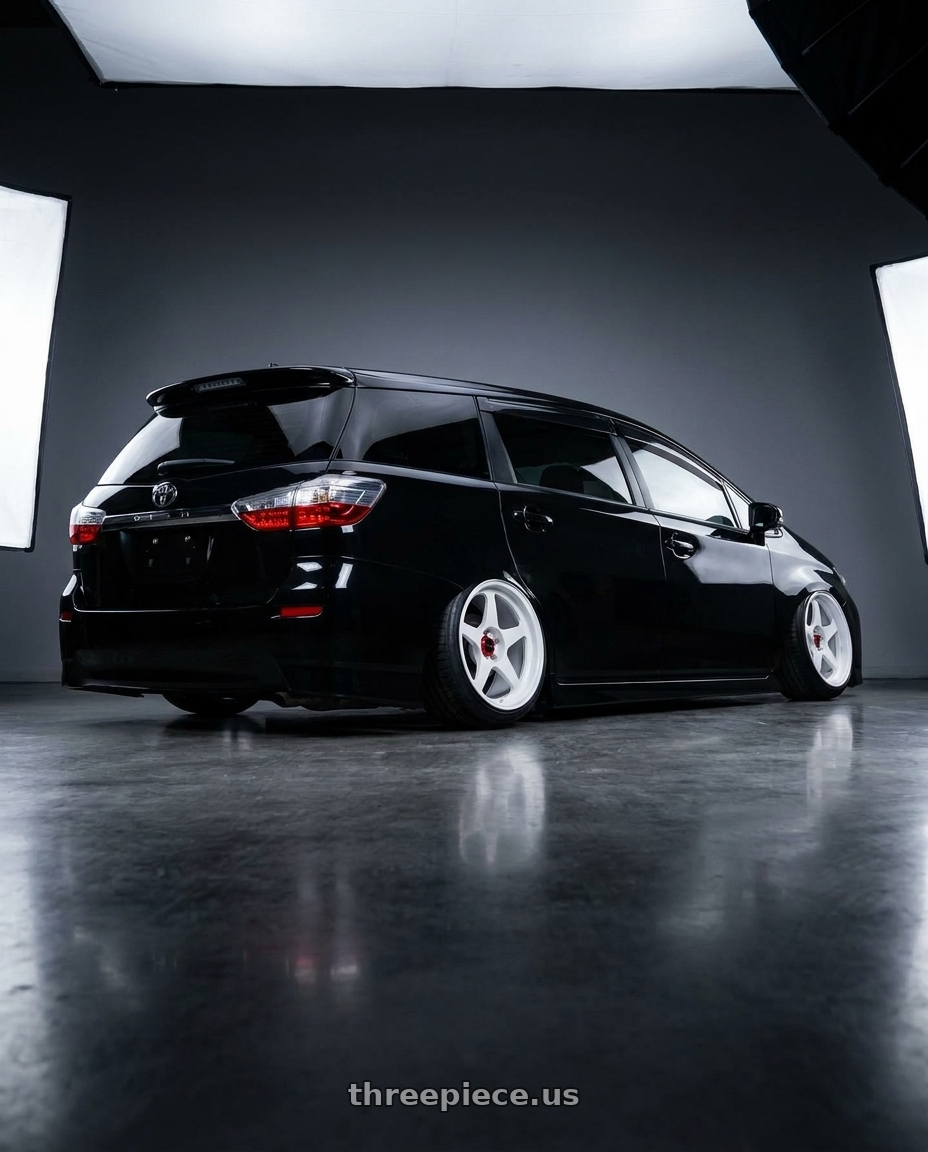 2014 Toyota Wish with R6061 Forged R1 5x100 18X8.5 +35 Championship White wheels rear three quarter view extreme stretch tires