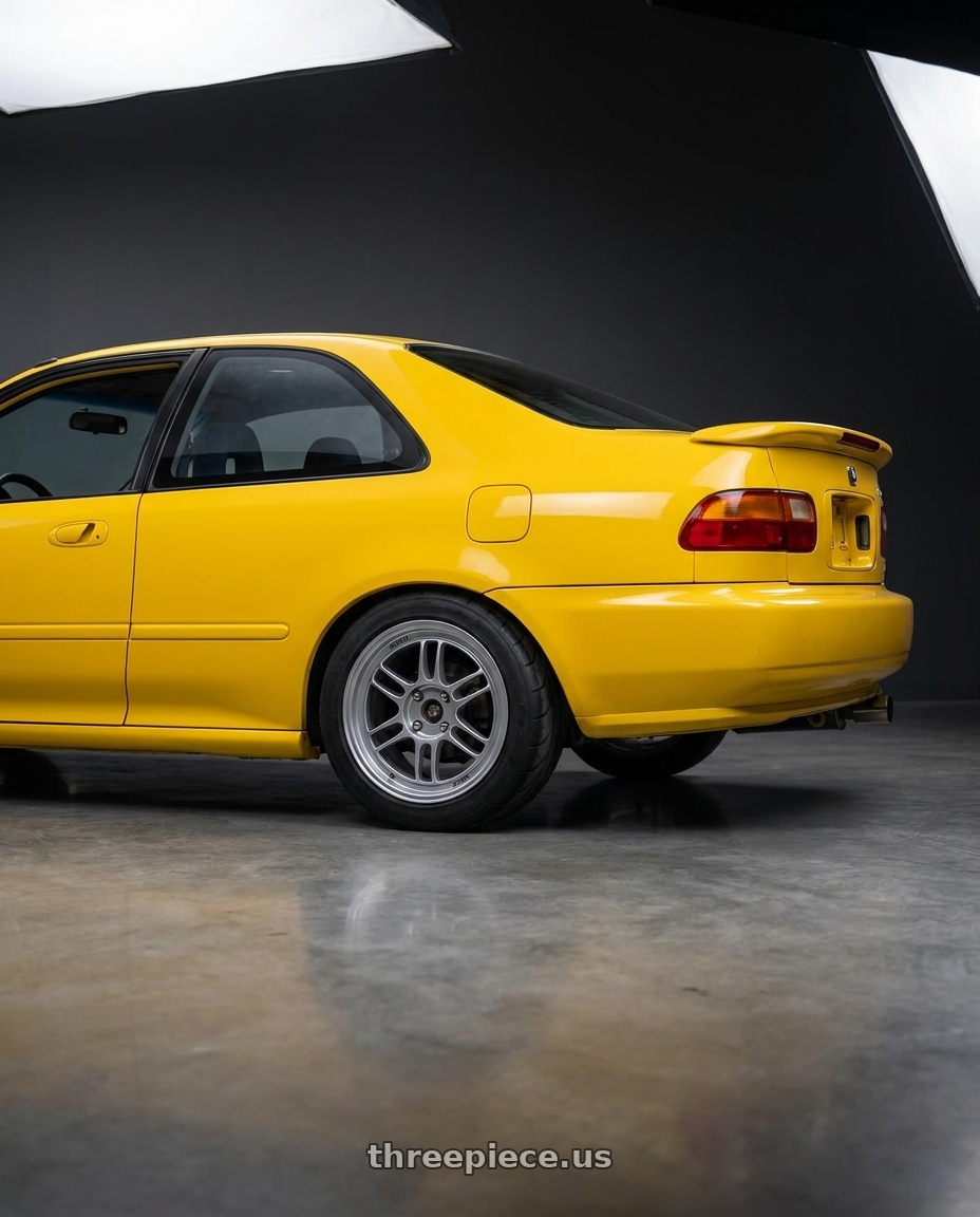 1995 Honda Civic Si with Enkei RPF1 4x100 15x7+35 Silver wheels rear three quarter view meaty tires