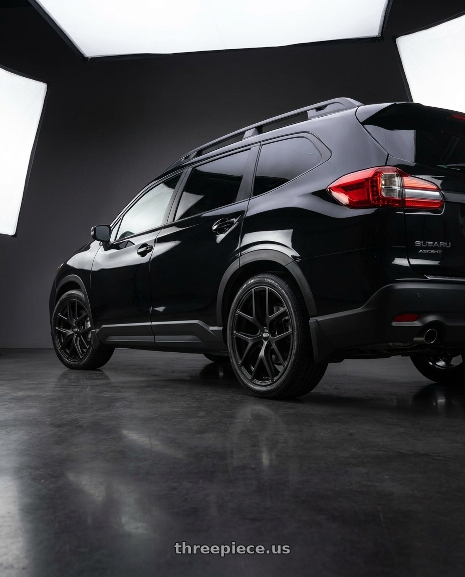 2025 Subaru Ascent Black with BBS TL-A 6x135 20x9.0+12 Satin Black wheels rear three quarter view square tires