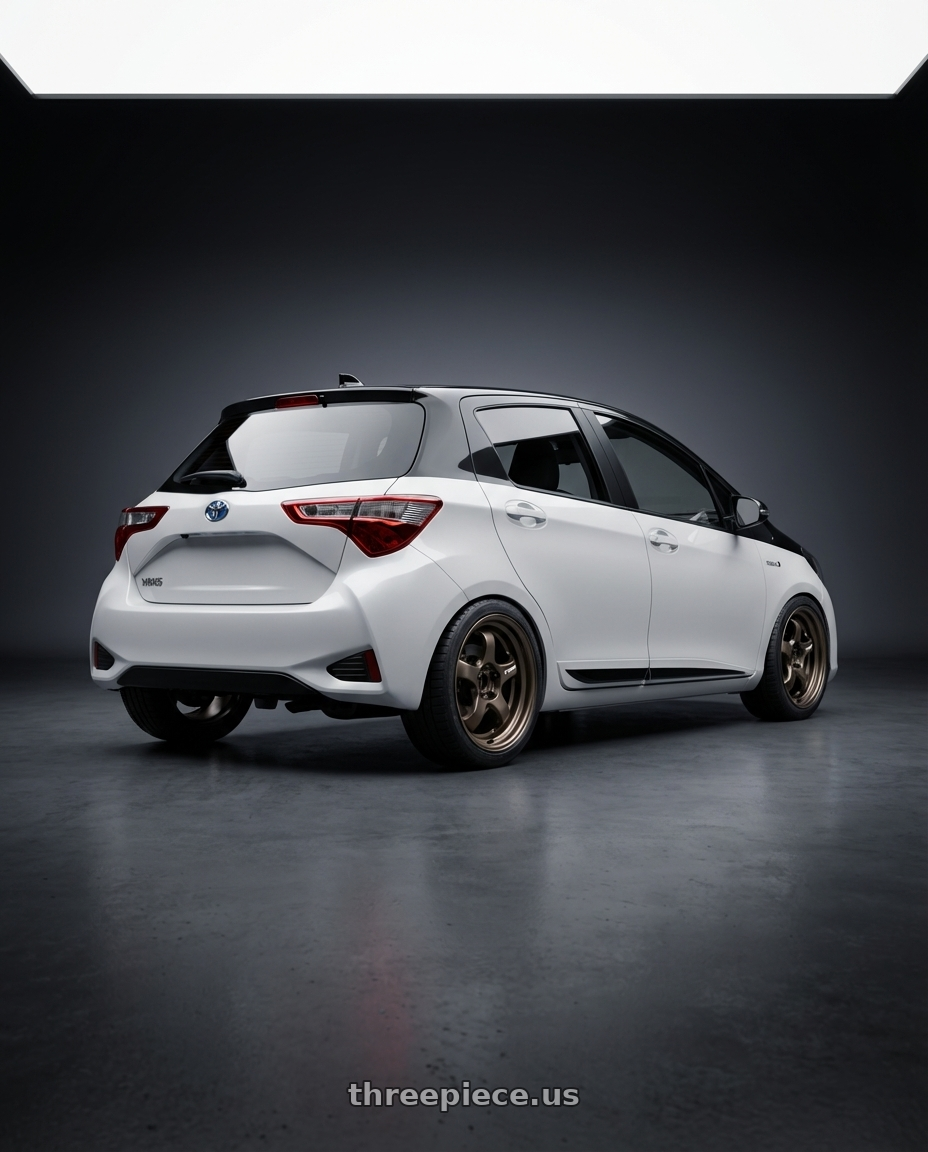 2020 Toyota Yaris Y20 with Work Meister S1R 5x100 16x8+12 O Disk Ashdot Titanium wheels rear three quarter view square tires