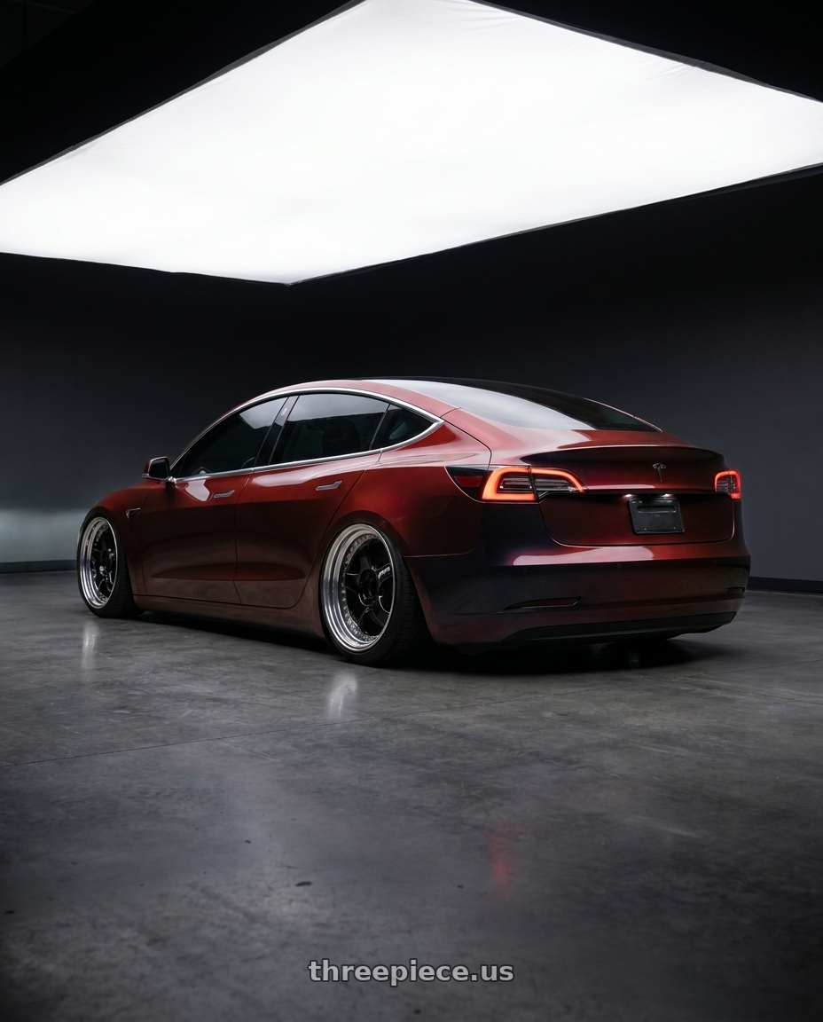 2019 Tesla Model 3, red black iridescent wrap with Work Meister S1 3P 5x100 18x7+48 A Disk Black wheels rear three quarter view slight stretch tires