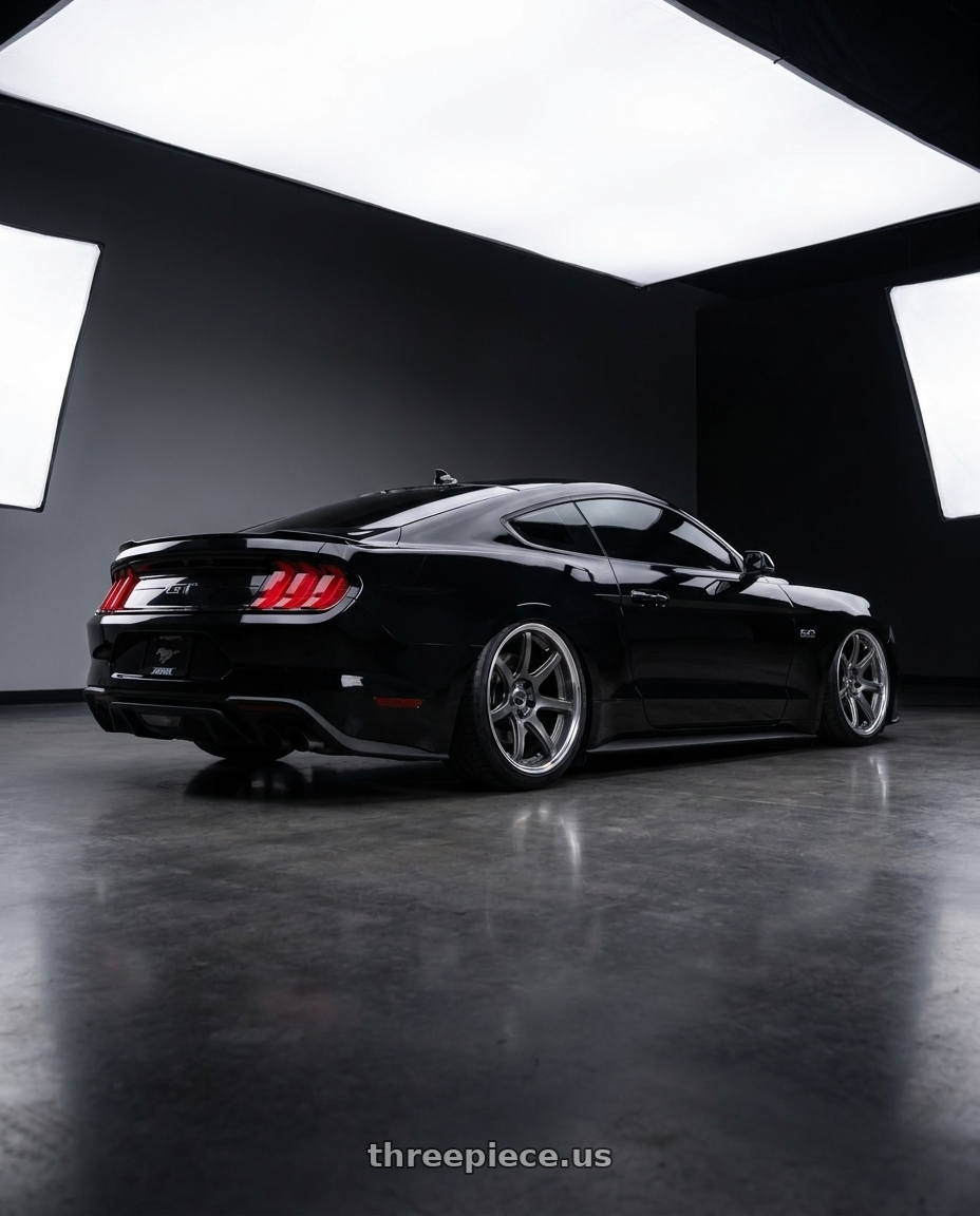 2022 Ford Mustang GT Premium with Work Emotion T7R 2P wheels rear three quarter view slight stretch tires