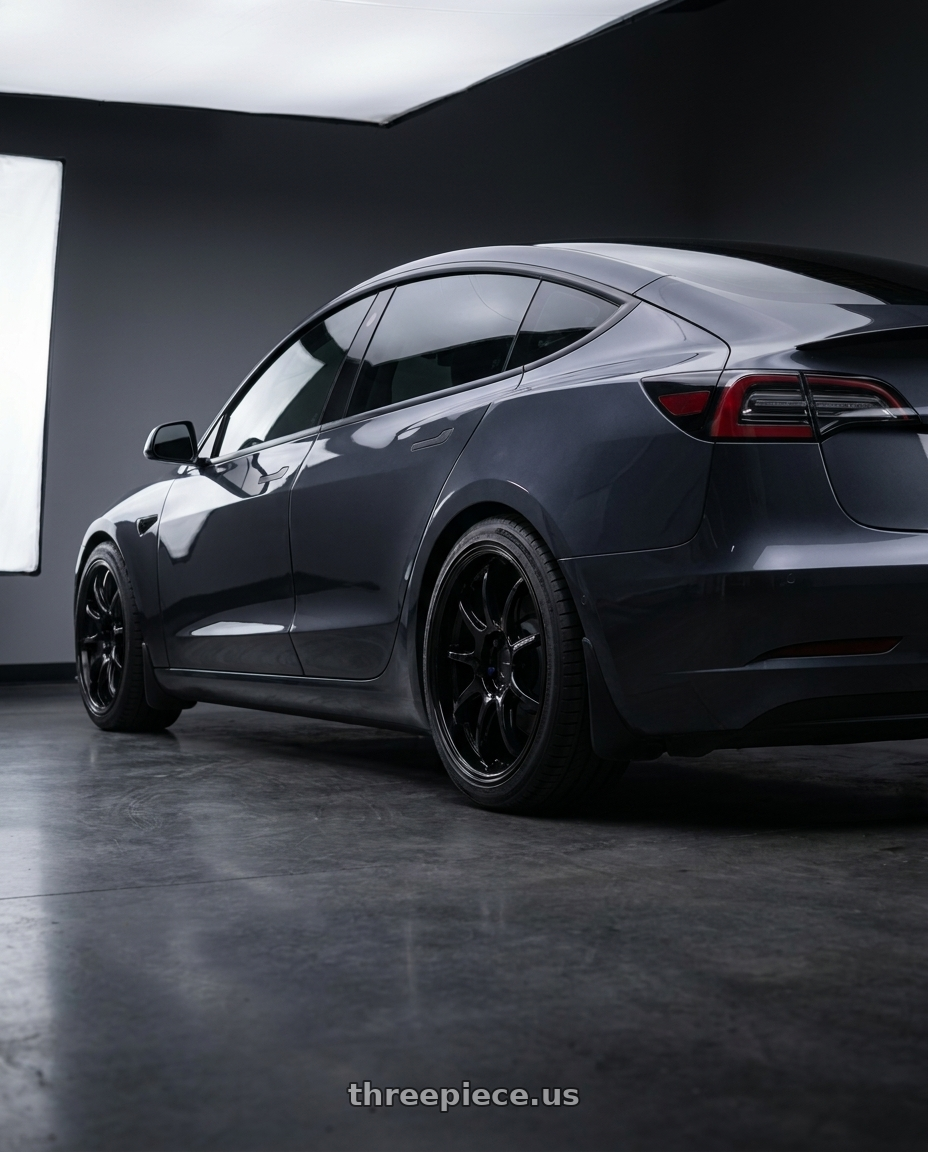 2024 tesla model 3 long with Work Emotion D9r 5x114.3 18x8.5 +38 Black wheels rear three quarter view slight stretch tires