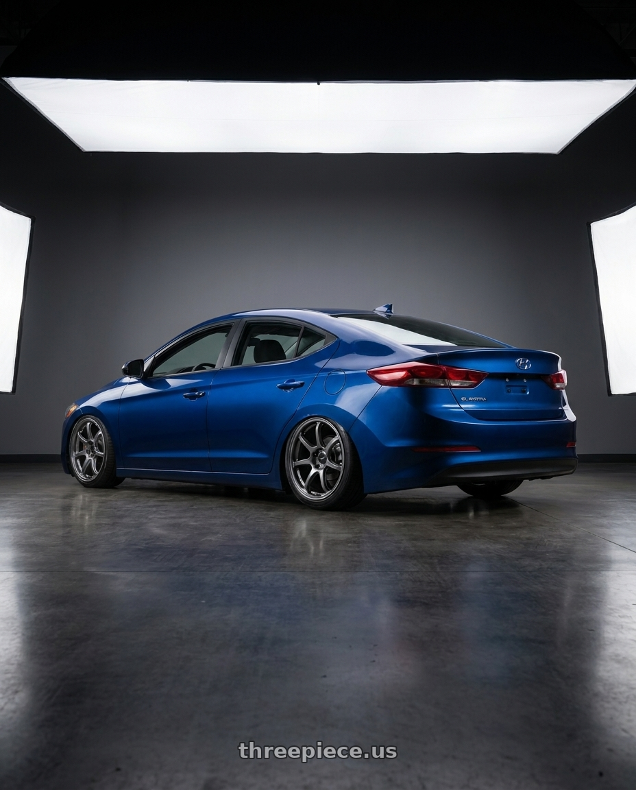 2017 Hyundai elantra with Enkei PF09 5x114.3 17x9+45 Dark Silver wheels rear three quarter view slight stretch tires