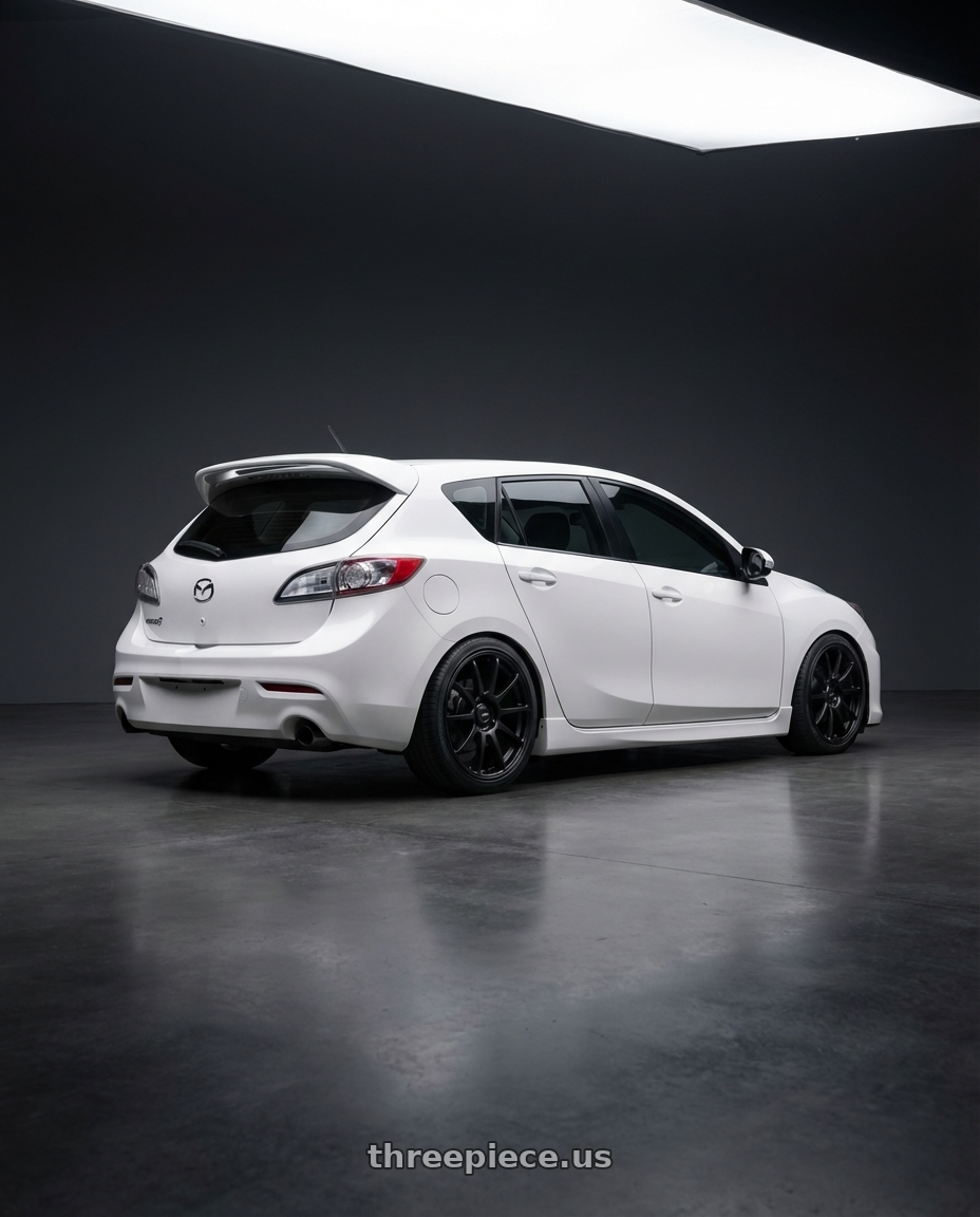 2012 Mazda Mazdaspeed3 with Ssr Gtv02 5x114.3 18x8.5+40  FLAT BLACK wheels rear three quarter view square tires