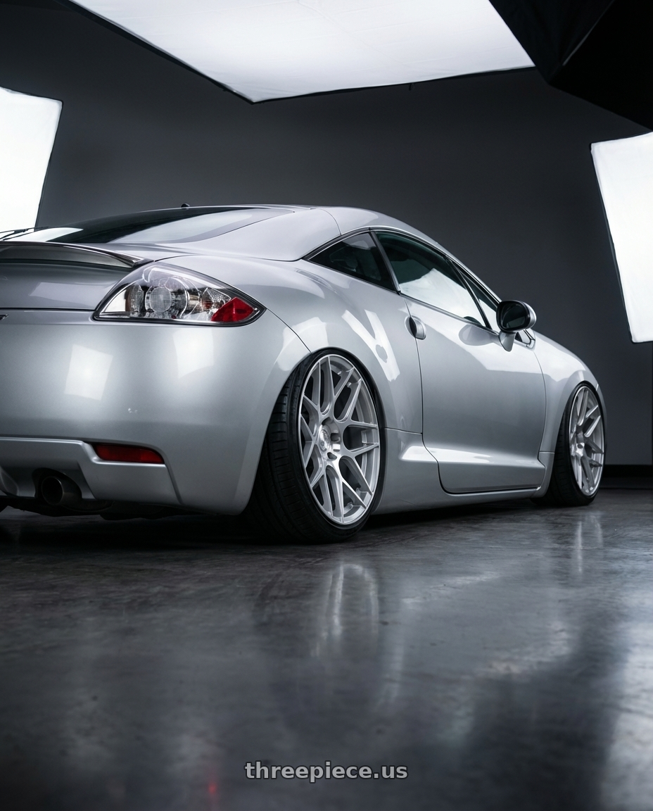 2010 Mitsubishi Eclipse with Aodhan AFF2 5x114.3 19x8.5+35 Gloss Silver Machined Face wheels rear three quarter view slight stretch tires