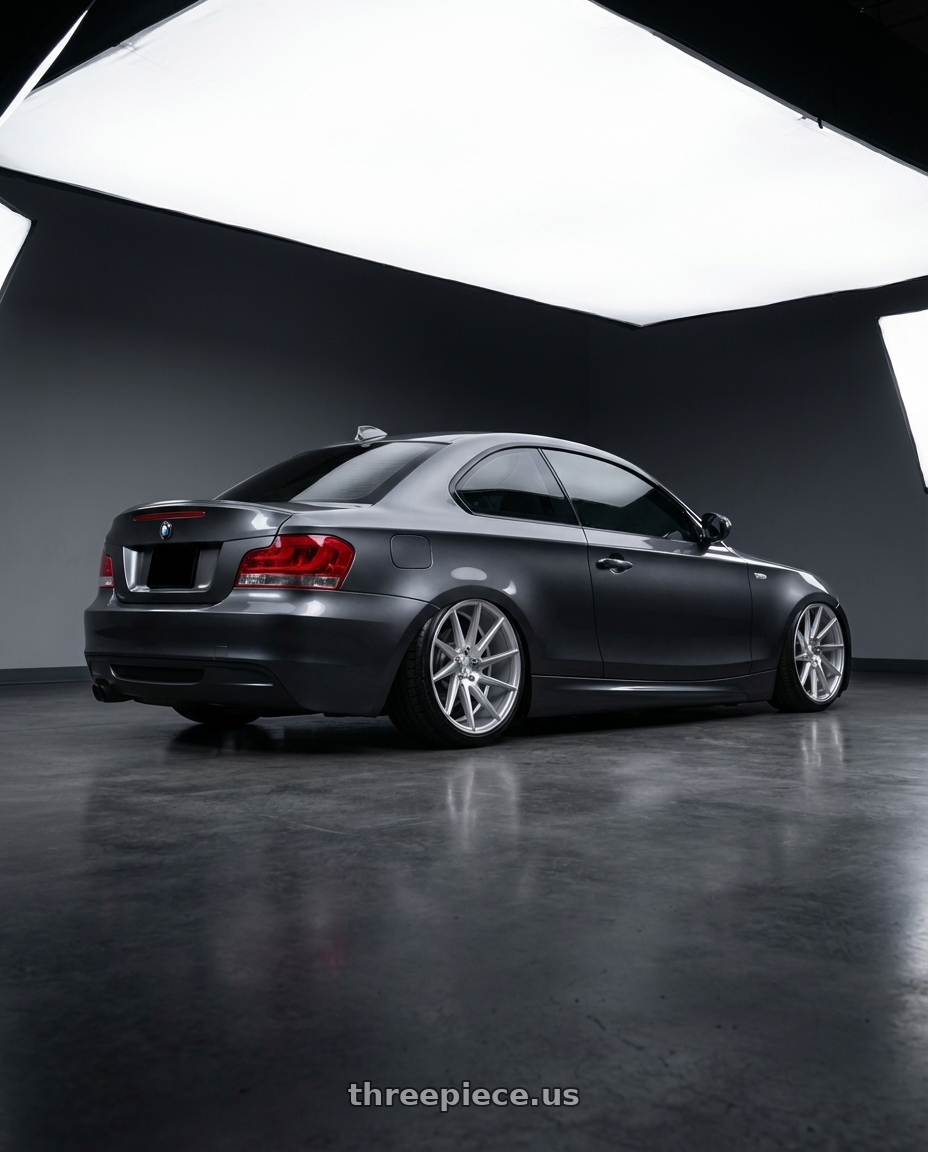 2012 BMW 1 Series E82 with Niche 1PC M112 SURGE 5X120 19X8.5 +35 GLOSS SILVER MACHINED wheels rear three quarter view slight stretch tires