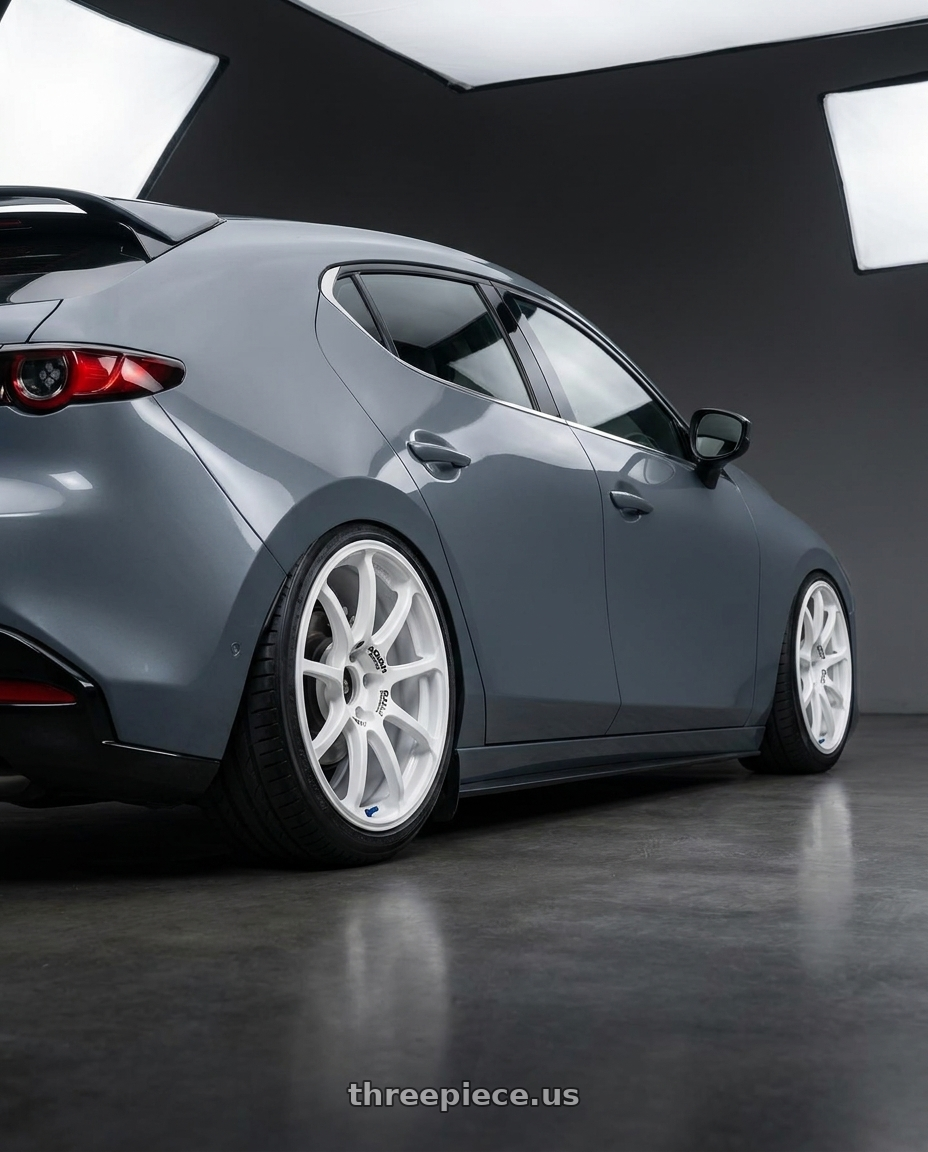 2023 Mazda Mazda3 Turbo with Advan RCIII 5x114.3 18x8.5+38 White wheels rear three quarter view slight stretch tires