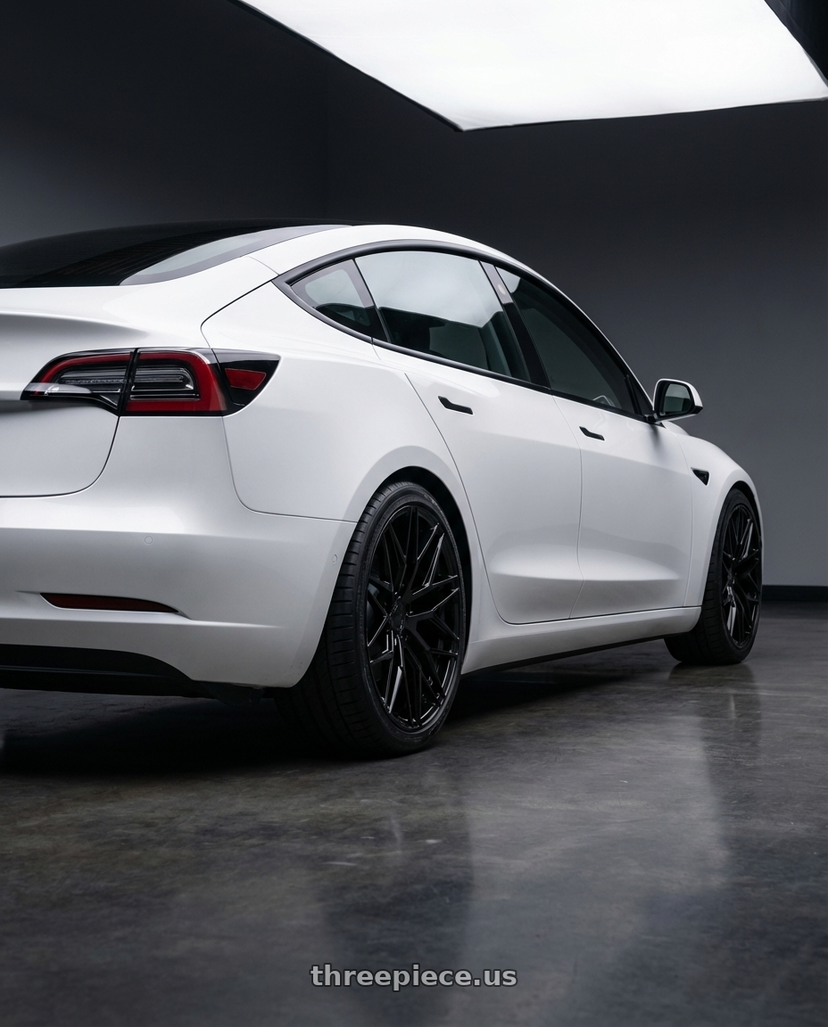 2023 Tesla Model 3 with Avant Garde Wheels M520R 5X114.3 19x8.5 +35 Gloss Black wheels rear three quarter view square tires