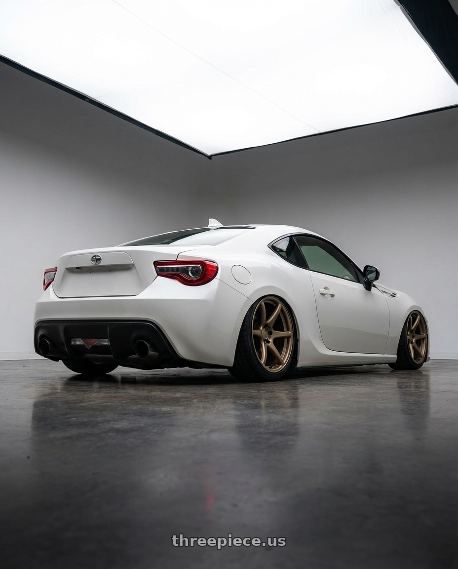 2016 Scion FR-S with Kansei K11B Tandem 5X100 18x10.5 12 Bronze wheels rear three quarter view slight stretch tires