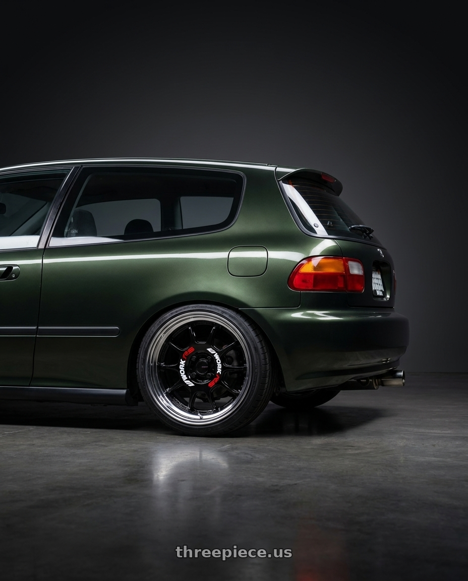 1995 honda civic dx hatchback nori green metalic with Work Emotion Rs11 2p 4x100 15x7 38 black wheels rear three quarter view square tires