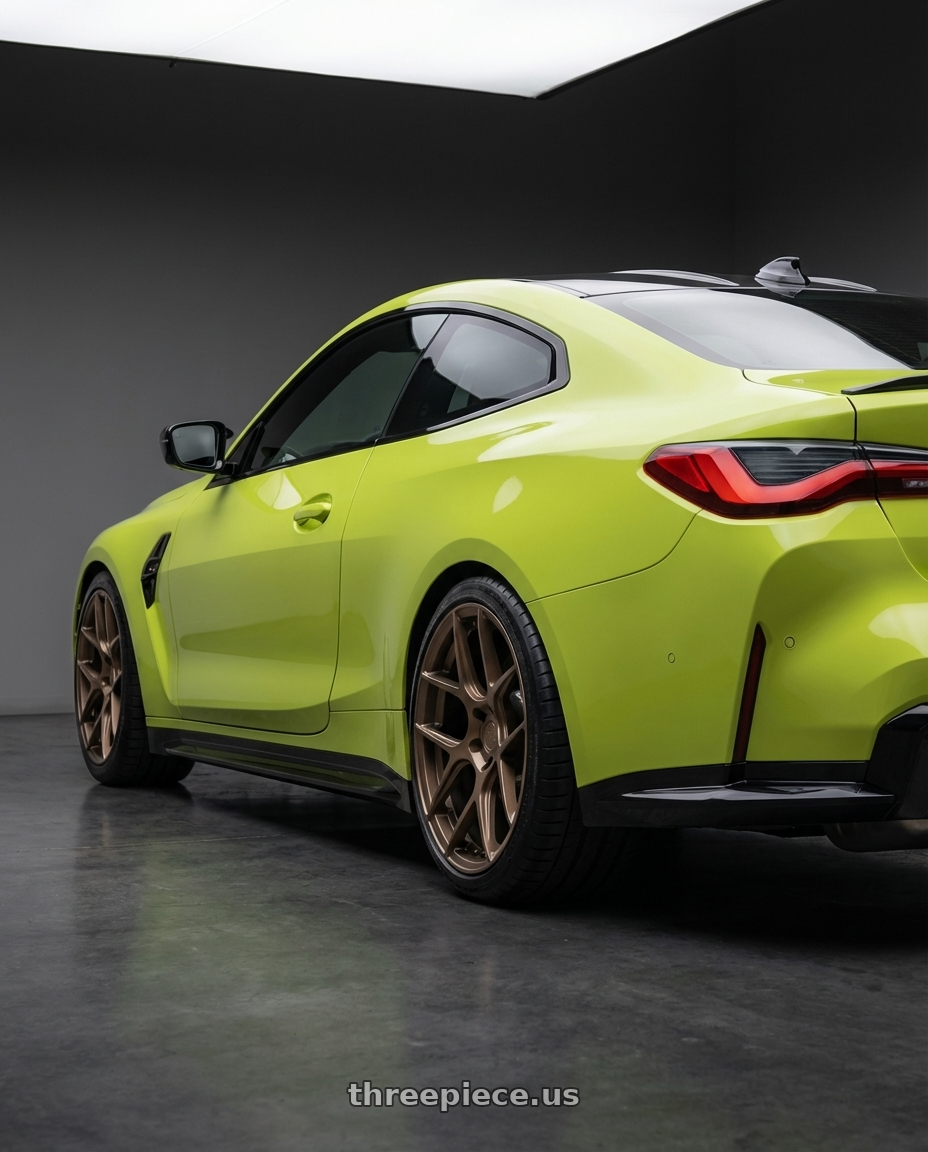 2024 BMW M4 G82 with Aodhan AFF2 5x112 19x9.5+35 Matte Bronze wheels rear three quarter view square tires