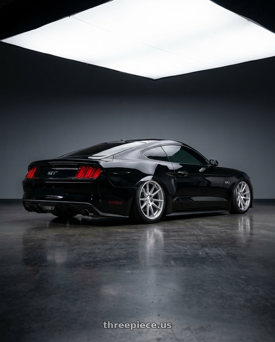 2017 Ford Mustang GT Black with Aodhan AFF2 5x114.3 19x9.5+35 Gloss Silver Machined Face wheels rear three quarter view square tires