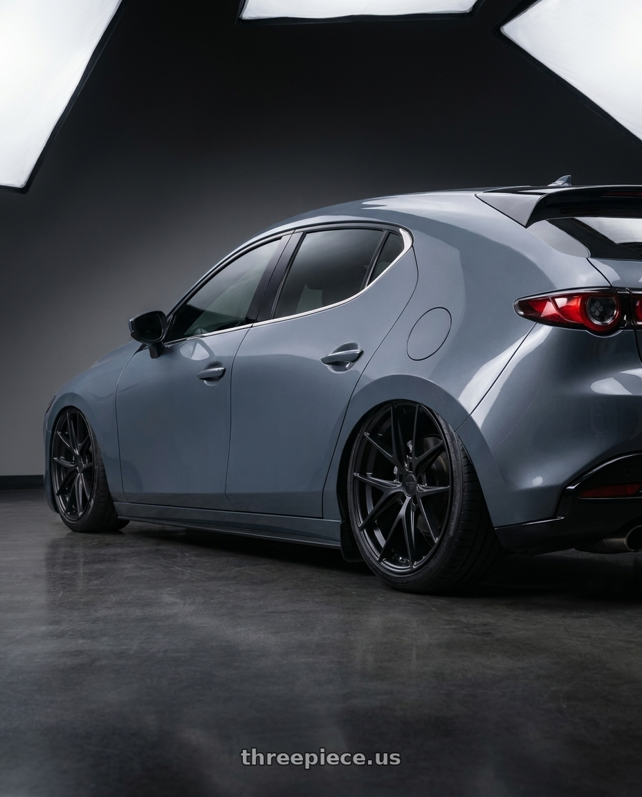 2023 Mazda Mazda3 Turbo with Niche 1PC M117 MISANO 5X114.3 18X9.5 +40 MATTE BLACK wheels rear three quarter view slight stretch tires