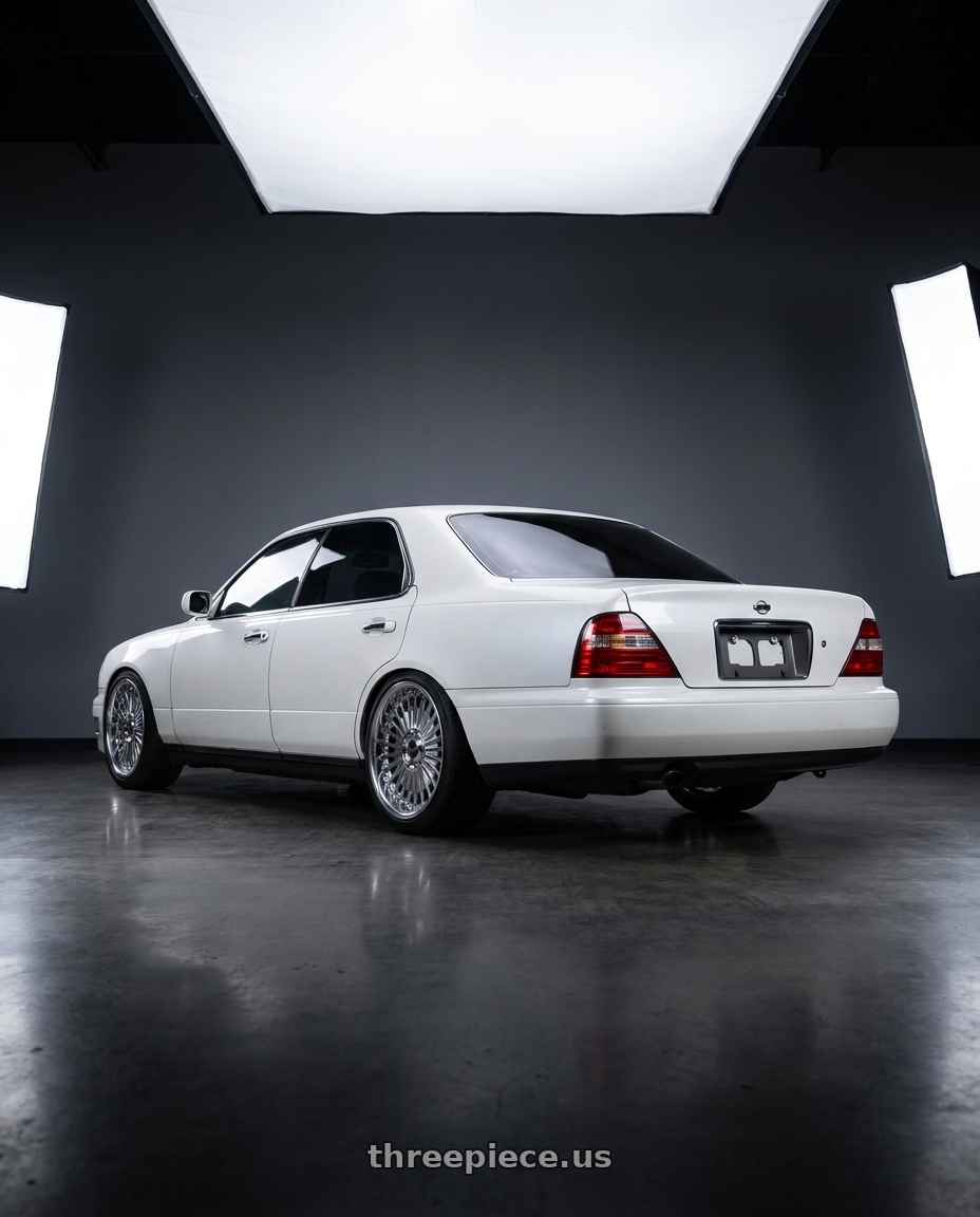 1996 Nissan Gloria with Work Emitz Chrome 5x114.3 19x8.5 +18 wheels rear three quarter view square tires