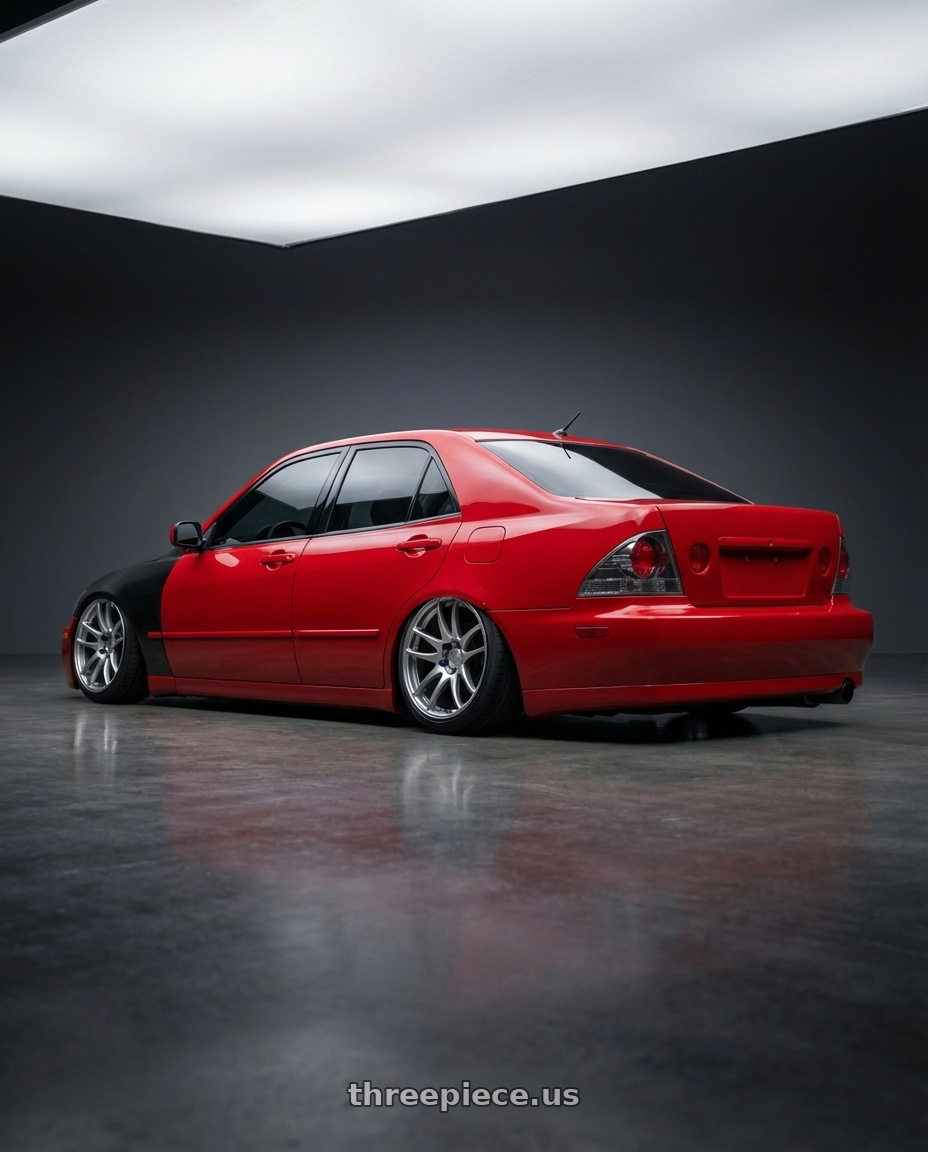 2003 Lexus IS300 with Work Emotion Cr Kiwami 4x100 15x5 +45 Gt Silver wheels rear three quarter view slight stretch tires