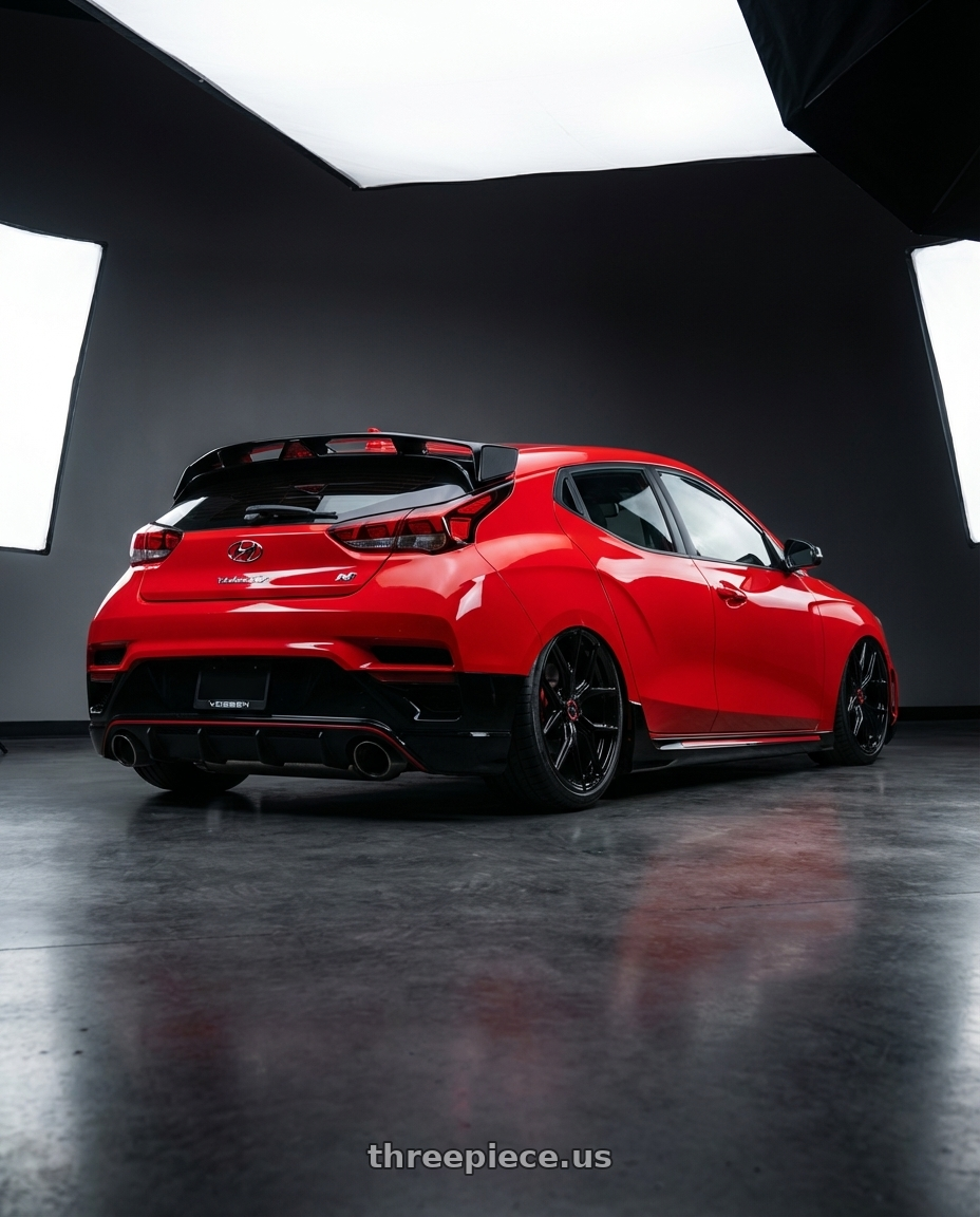 2022 Hyundai Veloster N with Vossen HF-5 19x8.5 / 5x114.3 / ET32 / Flat Face / 73.1 - Gloss Black Wheel - HF5-9N60 wheels rear three quarter view slight stretch tires