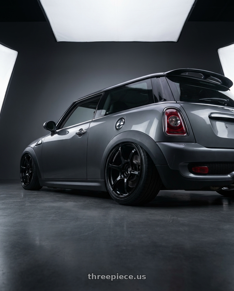 2010 Mini Cooper S R56 with Advan RGIII 4x100 17x7.0+42 Gloss Black wheels rear three quarter view slight stretch tires