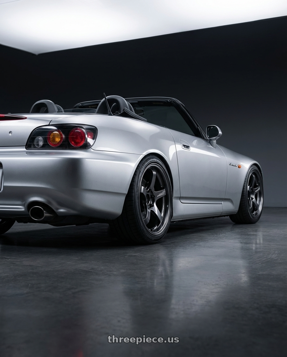 2009 Honda S2000 with Advan Racing GT BEYOND 5x114.3 17x9.5 +35 RACING TITANIUM BLACK wheels rear three quarter view square tires