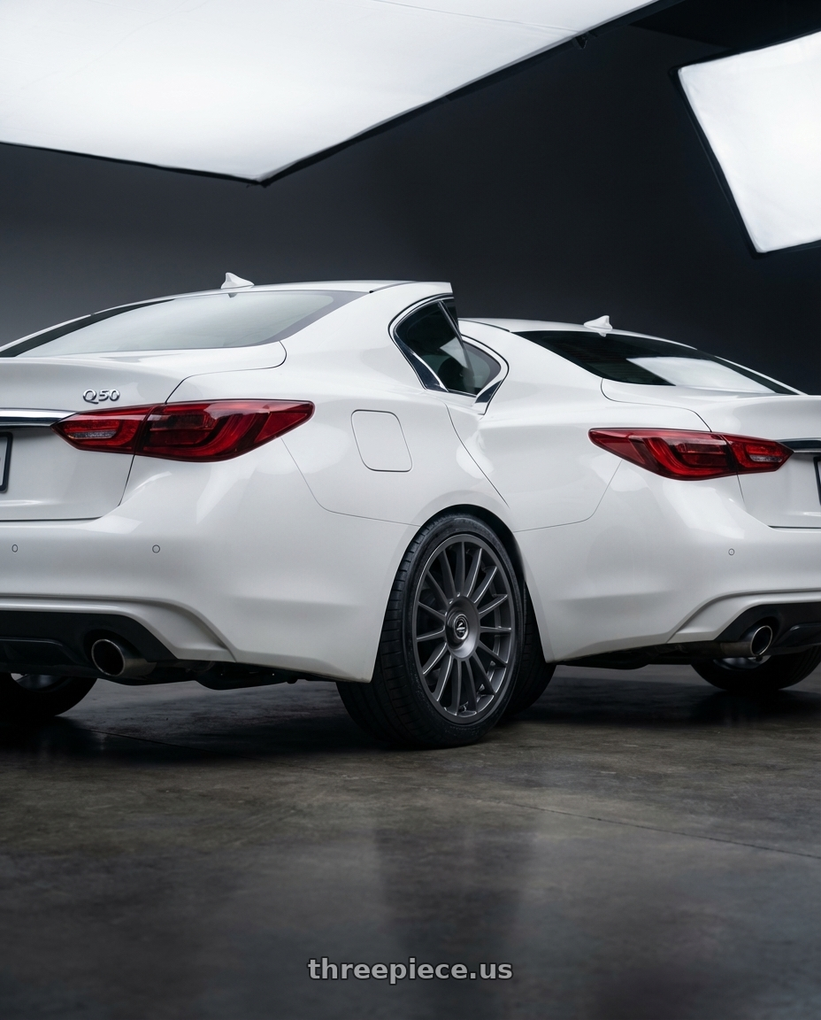 2020 Infiniti Q50 with fifteen52 PODIUM 5x114.3 / 5x120 19x8.5 +35 FROSTED GRAPHITE (SATIN GREY) wheels rear three quarter view square tires