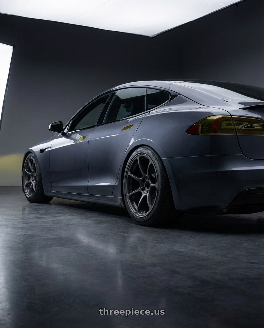 2021 tesla model s plaid with Volk Racing NE24 5x120 19x10 +34 MATTE GUNBLACK wheels rear three quarter view meaty tires