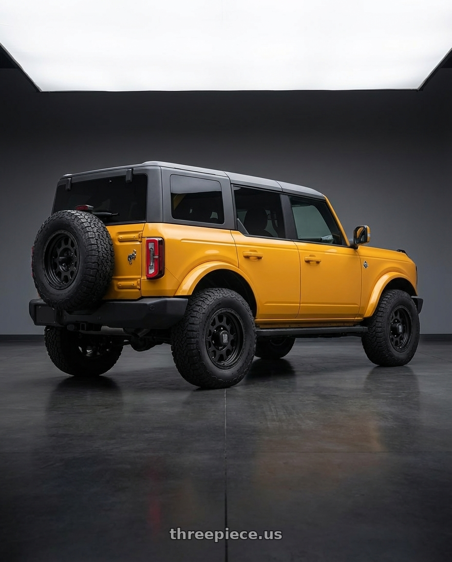 2024 Ford Bronco with XD XD122 ENDURO 6X139.7 17X9 -6 MATTE BLACK wheels rear three quarter view meaty tires