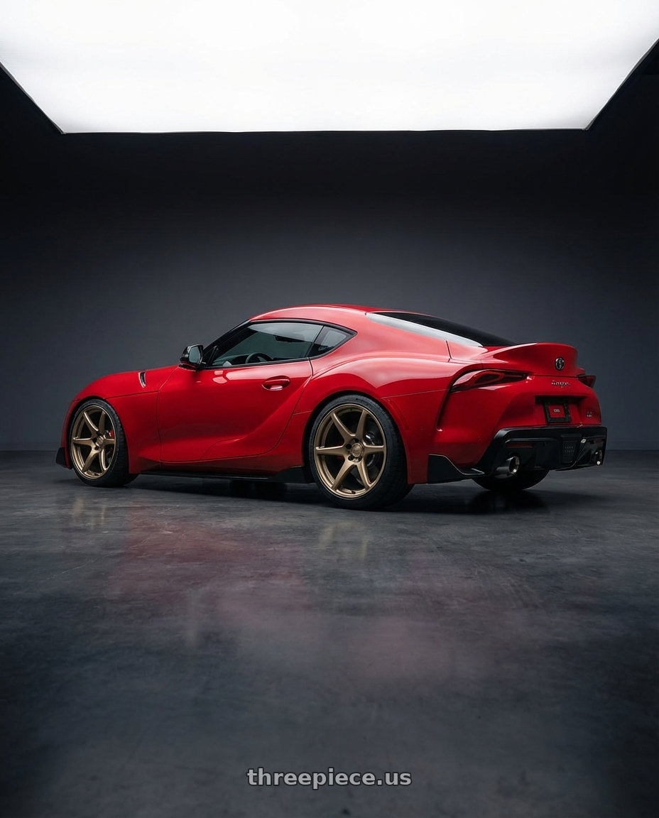 2023 Toyota GR Supra with Kansei K11B Tandem 5X112 19x10.5 22 Bronze wheels rear three quarter view square tires