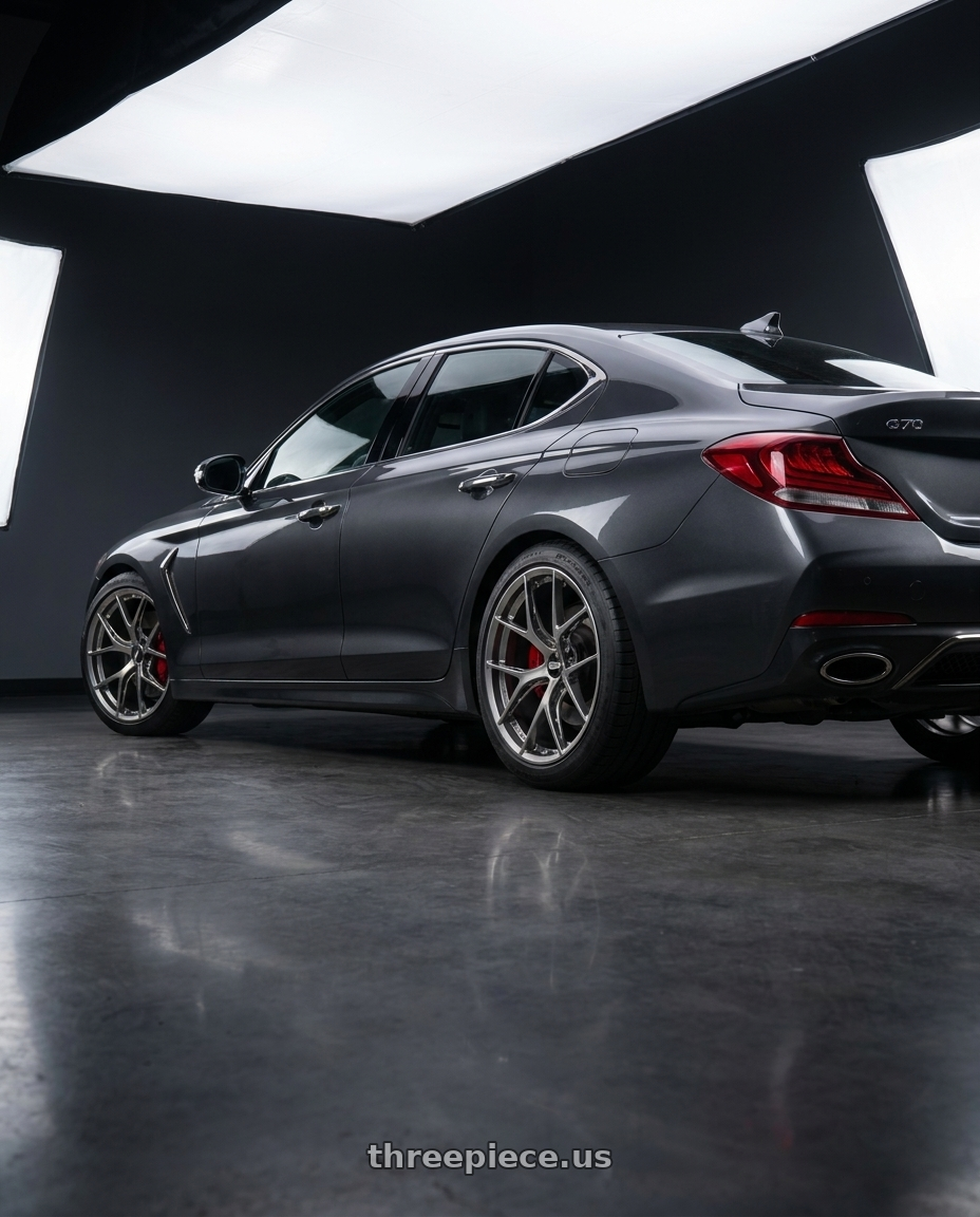 2019 Genesis G70 with BBS FI-R Evo CL 21x12.0+45 Platinum Silver wheels rear three quarter view slight stretch tires